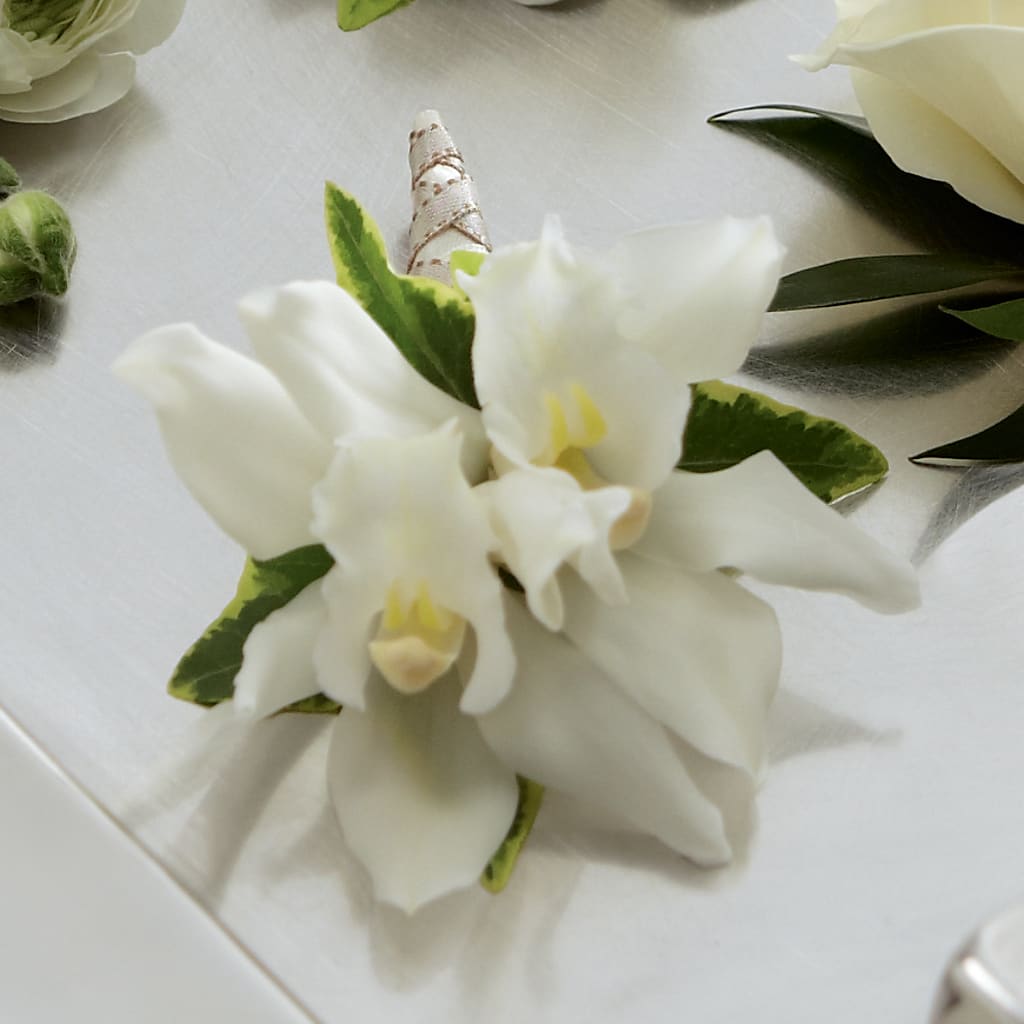 White Mini Cymbidium Boutonniere – Millennial Florist, Hartsdale NY